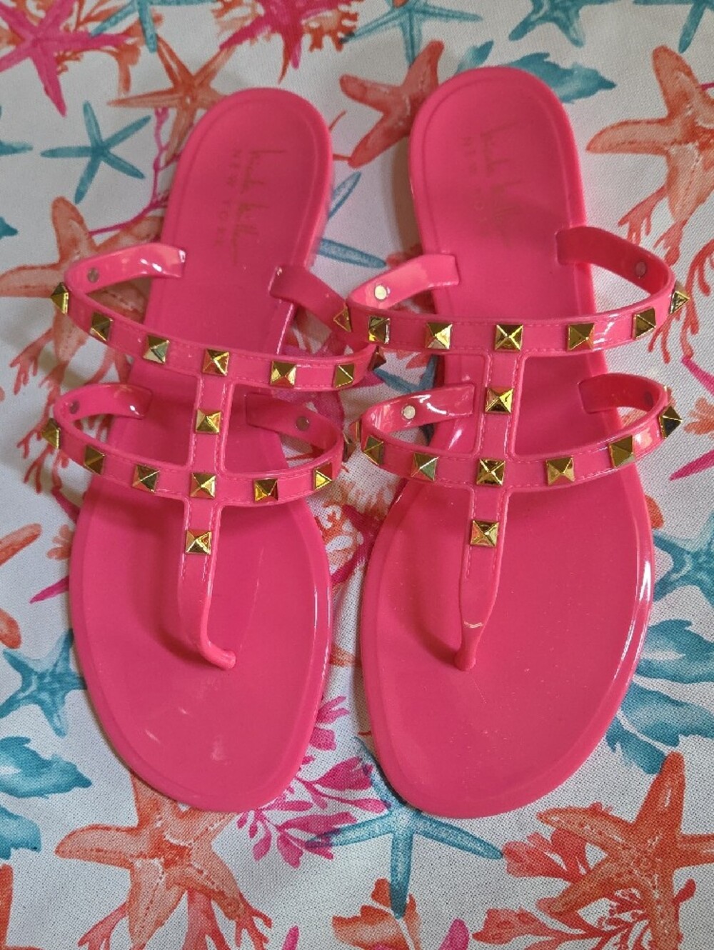 Nicole Miller Hot Pink Jelly Flip Sandals with Gold Logo